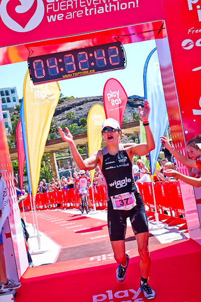 Emma-Kate Lidbury crossing the finish line in 2012